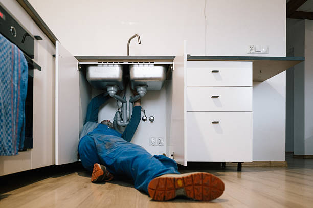 Professional Drain Cleaning technician working in Elkins, AR